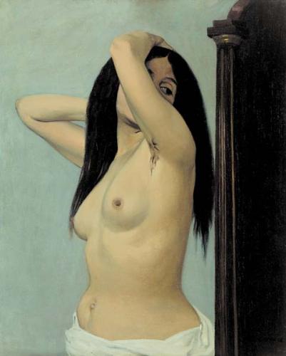 Femme nue regardant dans une Psyché